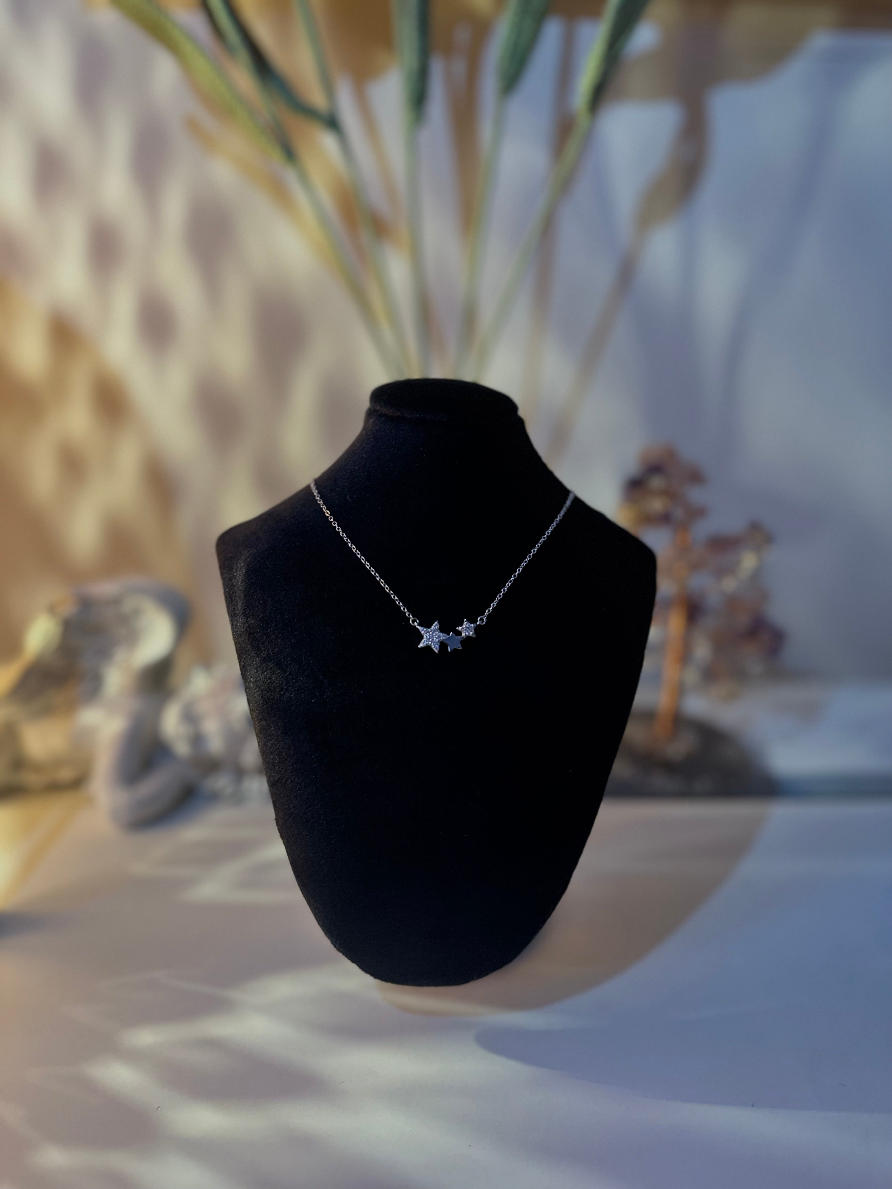 Triplets in silver necklace